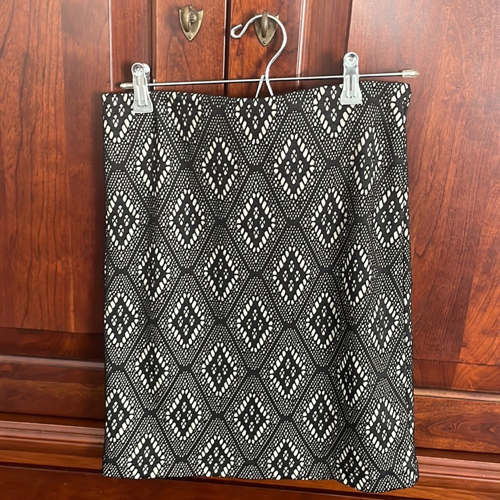 ReneeC Black Lace like material skirt. Size SP